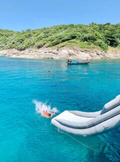 sunrise-divers-daytrip-racha-yai-boat-inflatable-slide-splash